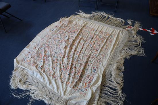 A Chinese embroidered silk table cover, late Qing dynasty, 153cm square excluding fringe